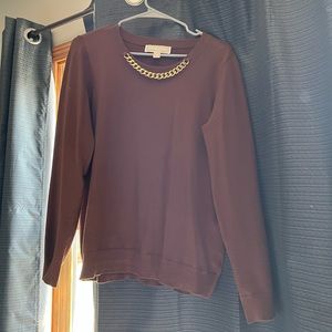 Brown sweater with gold chain